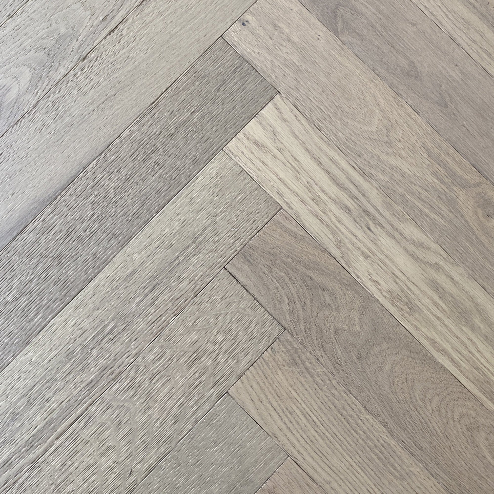 Herringbone Sand EIR 12mm AC-4